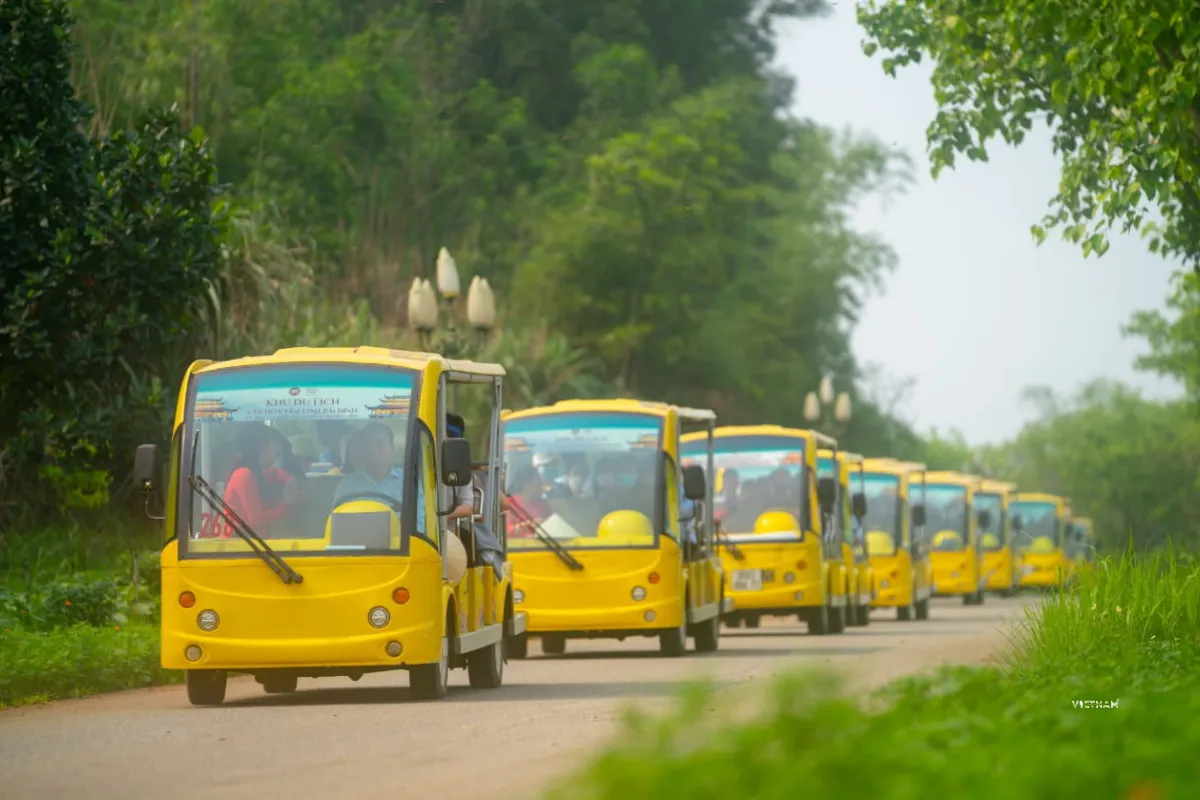 Best Trang An Grottoes Tour with Bai Dinh Pagoda | Ninh Binh Day Trip Bai Dinh Pagoda electric car transport for visitors