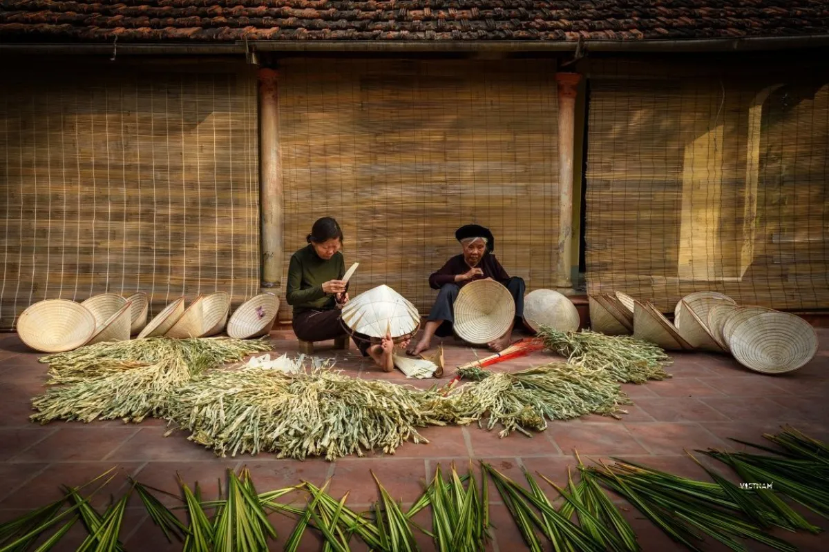 Exclusive Hanoi to Ninh Binh Day Tour: Incense Village & Trang An Boat Conical hat making crafts women working by hand