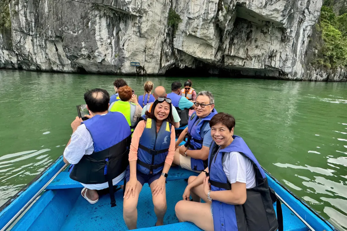 Halong Bay 1 Day Cruise | Perfect Tour to Explore Vietnam’s Iconic Bay Halong Bay 1 day cruise tour bamboo boat experience in tranquil lagoon