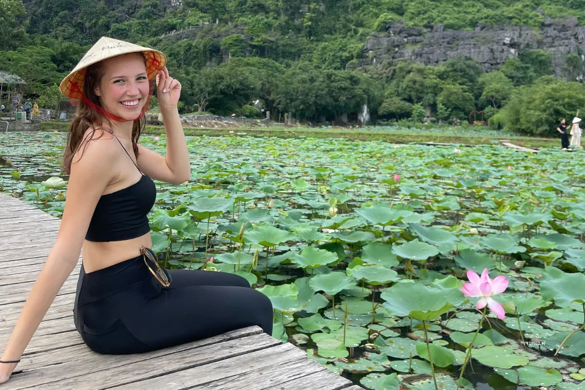 Exclusive Bai Dinh Pagoda Tour | Private Trip to Trang An | Mua Cave Mua Cave lotus lake with blooming flowers and mountains