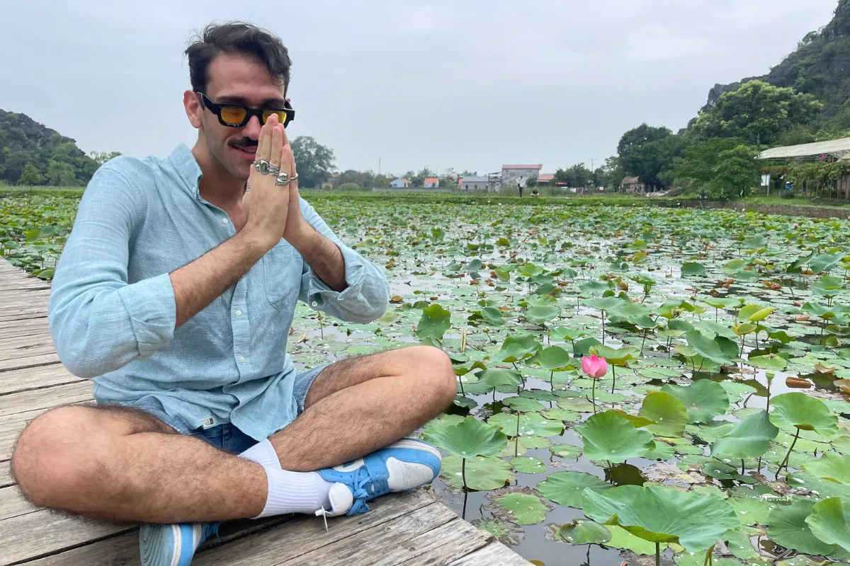 Trang An Private Tour | Explore Hidden Paradise | Hoa Lu & Hang Mua Cave Hang Mua lotus lake surrounded by limestone mountains
