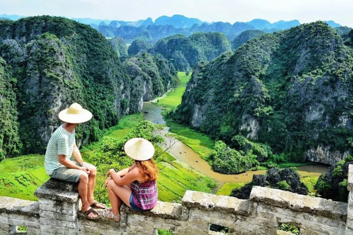 Hang Mua viewpoint dragon statue overlooking Tam Coc valley