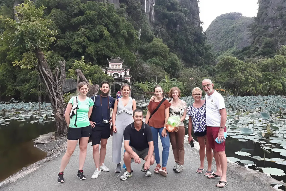 Tam Coc Private Tour | Hoa Lu Ancient Capital | Cycling to Bich Dong Tam Coc private one day tour passing riverside temple
