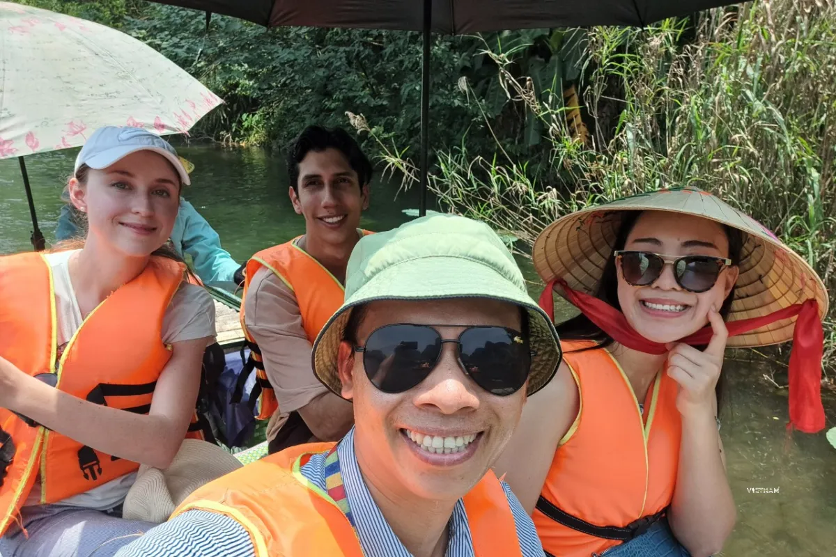 Best Trang An Grottoes Tour with Bai Dinh Pagoda | Ninh Binh Day Trip Trang An boat tour passing through natural limestone cave