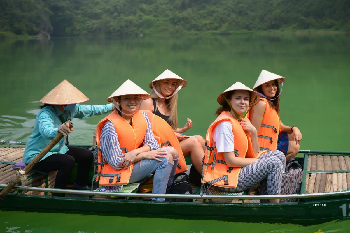 Trang An private tour boat ride through limestone mountains