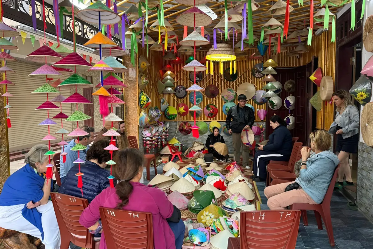 Exclusive Hanoi to Ninh Binh Day Tour: Incense Village & Trang An Boat Artisan making conical hat in hat village Hanoi