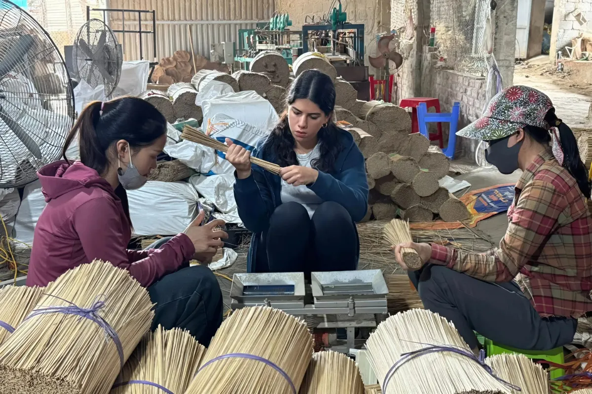 Exclusive Hanoi to Ninh Binh Day Tour: Incense Village & Trang An Boat Local artisan making incense sticks in Hanoi incense village