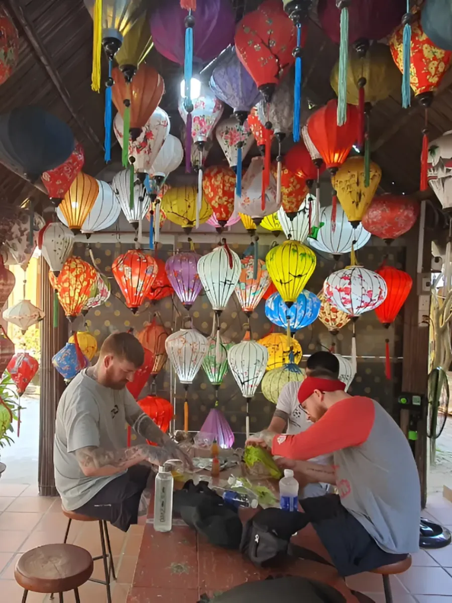 Travelers joining a traditional lantern workshop during a 4-day Da Nang itinerary in Vietnam